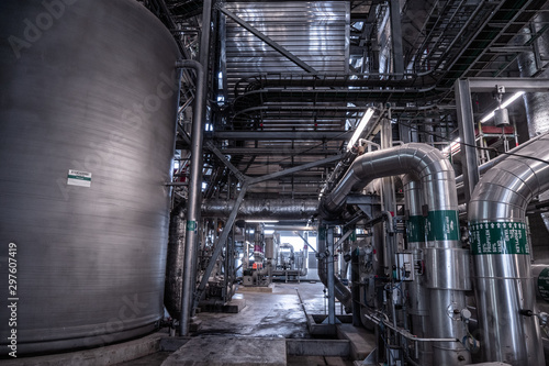 View of the plant from the outside, pipes smoke, wind turbines in the sea, barrels, tanks, thermal power plant, modern, technological waste processing plant, garbage processing plant
