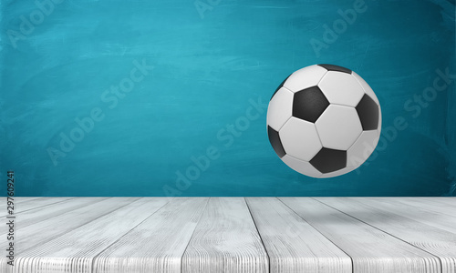 3d rendering of football ball on white wooden floor and dark turquoise background