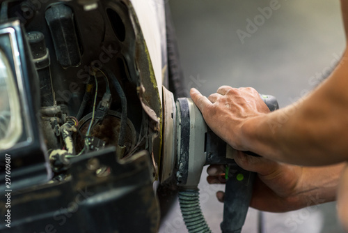 Mechanic working in auto shop.