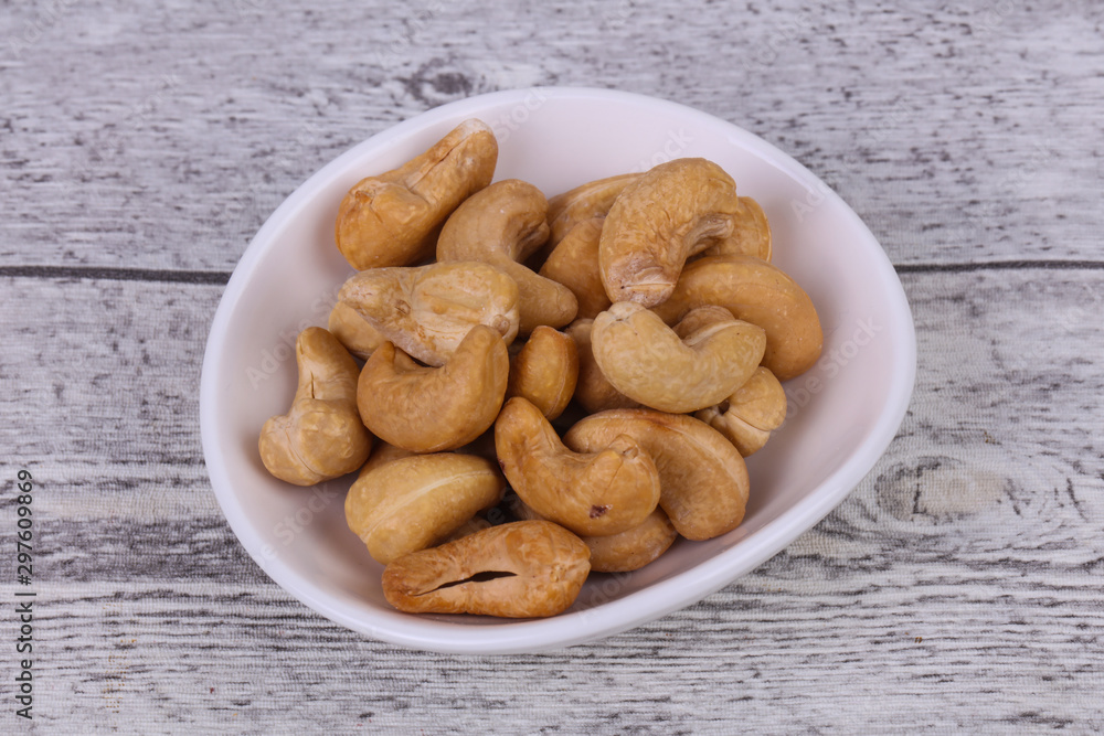 Cashew nuts heap in the bowl Cashew nuts heap in the bowl
