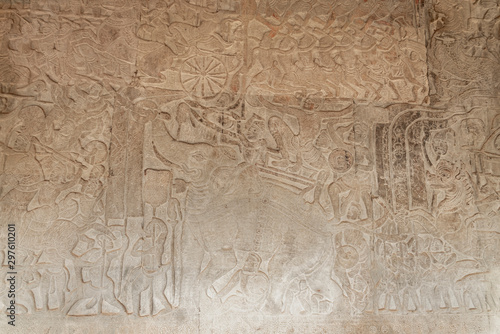 Scene of the Churning of the Milk Ocean carvings status on the wall of Angkor wat temple, world heritage, Siemreap, Cambodia