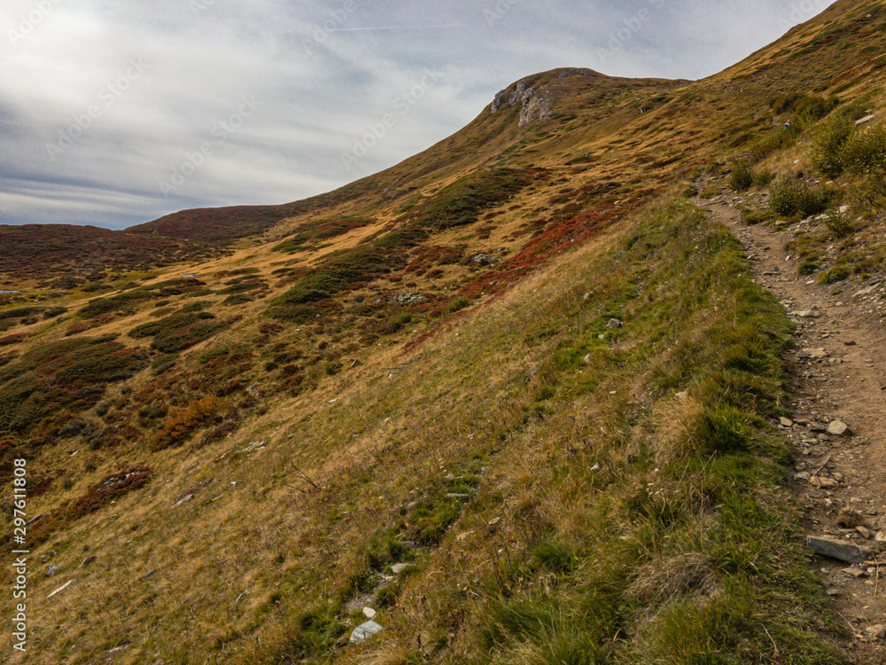Panoramic view of the Piora region, in Switzerland, in the colors of autumn. Panoramic view of the Piora region, in Switzerland, in the colors of autumn.