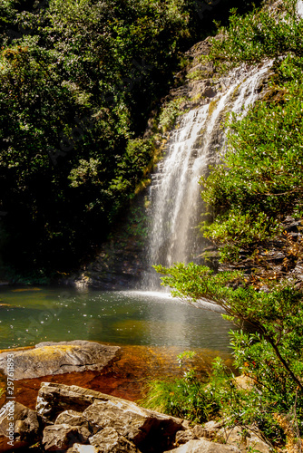 Fototapeta Naklejka Na Ścianę i Meble -  Farofa Waterfall with Lake, Rocky Wall and Vegetation, Serra do Cipo National Park, Minas Gerais, Brazil