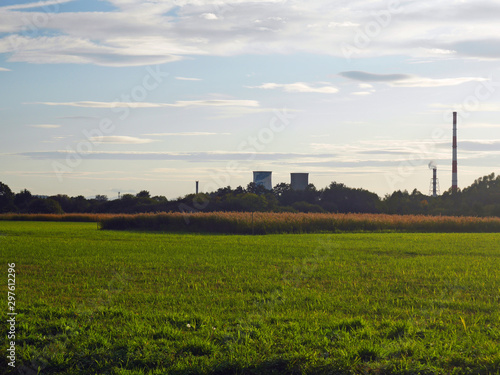 sunset over green field countryside