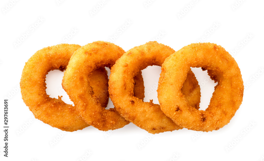 Onion rings lie flat on a white background. The view of the top. Onion rings lie flat on a white background. The view of the top.