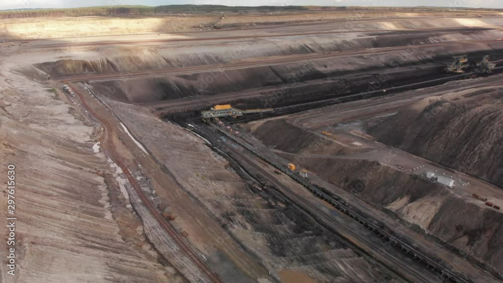Aerial drone flight of industry machinery in surface mine, Jänschwalde Germany Aerial drone flight of industry machinery in surface mine, Jänschwalde Germany