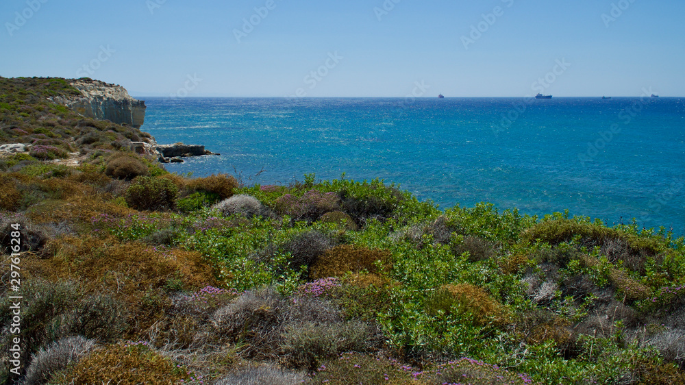 Aegean sea coast and sandy coves and paths