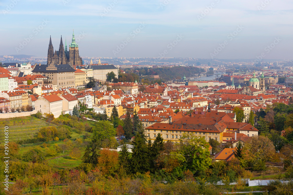 Autumn Prague City with gothic Castle and colorful Nature and Trees from the Hill Petrin, Czech Republic
