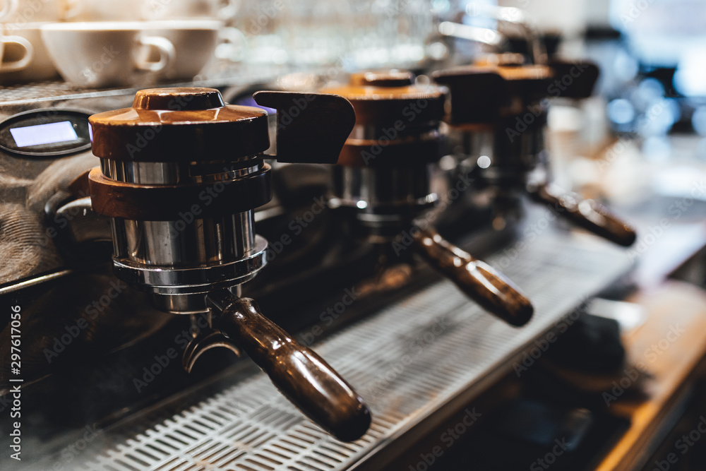 Espresso machine in close up, barista making coffee