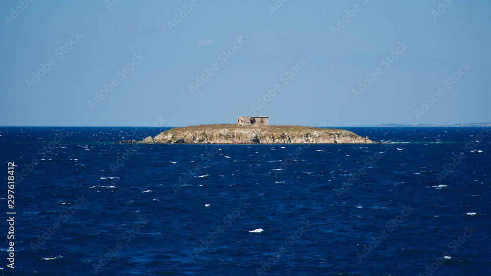 Old ruin structure on island in Aegean sea