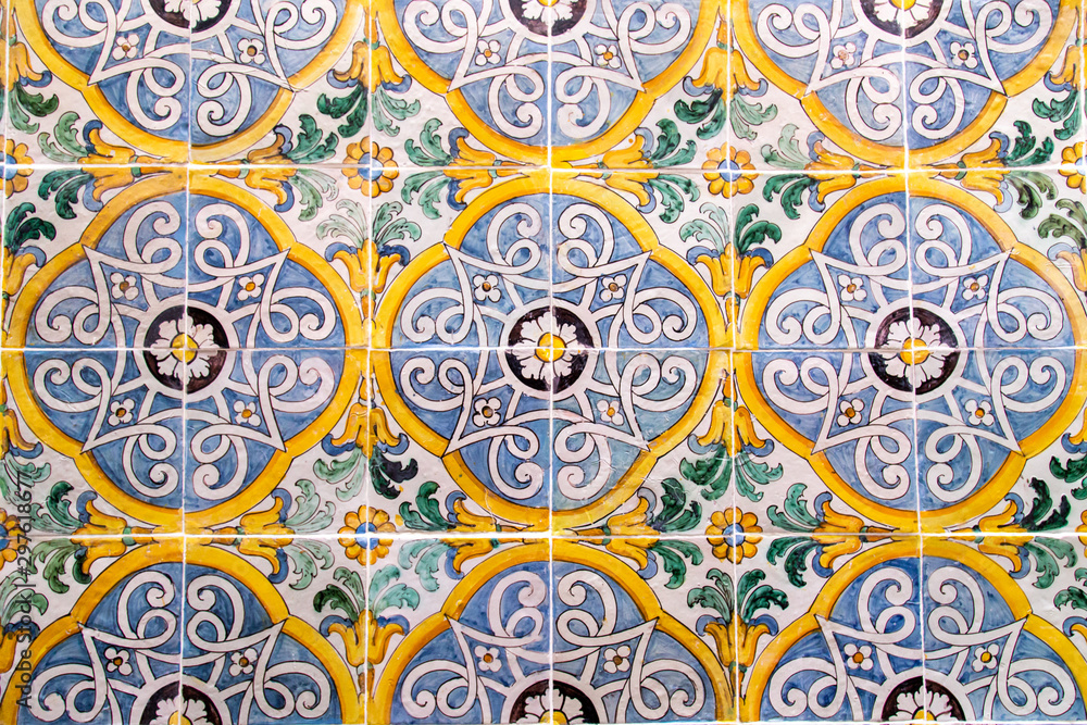 Handmade old Turkish Blue ceramic Tiles on the wall in Istanbul City, Turkey. Close up. Ancient Ottoman patterned Iznik syle design tile composition. Flower patterns on ceramic tiles