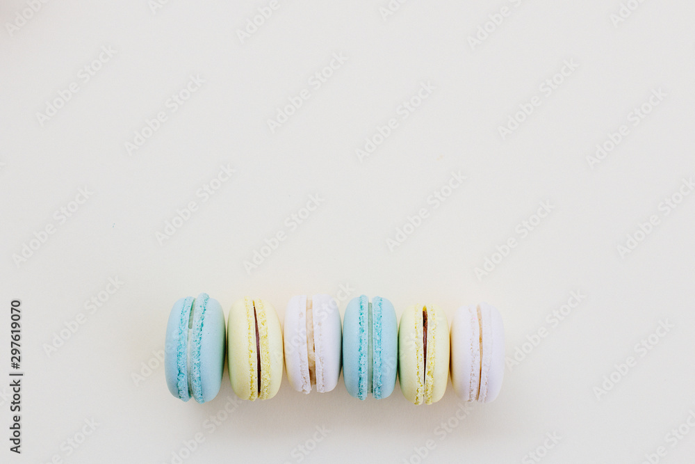Macaroons on a yellow background. Macaroons on a yellow background.