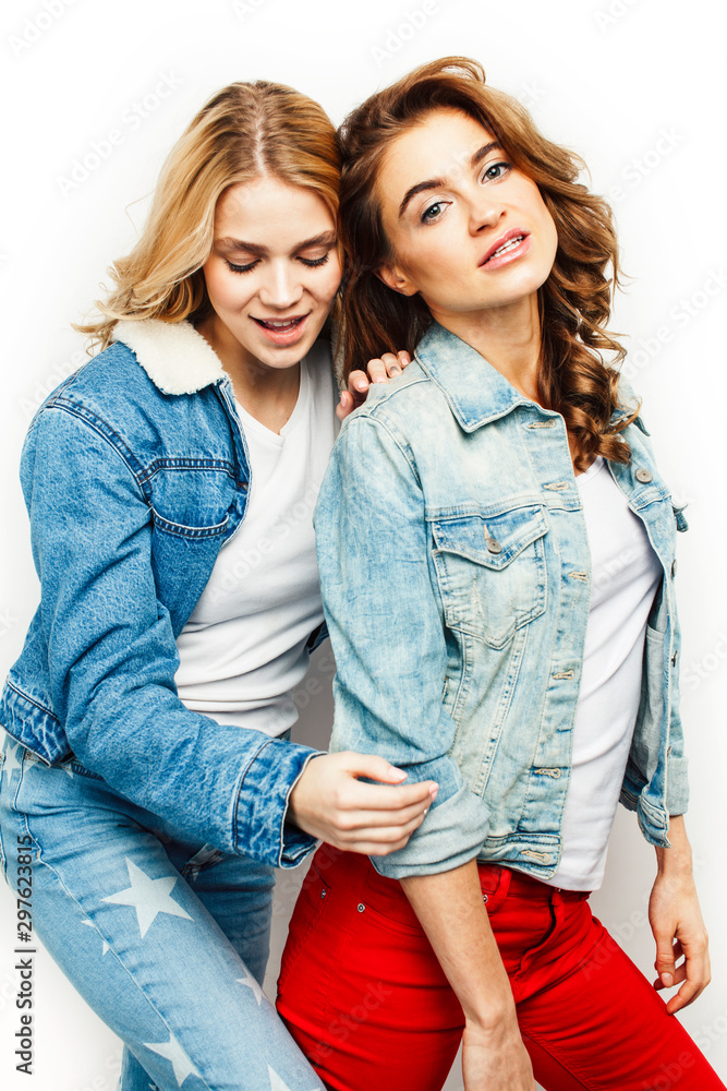 best friends teenage girls together having fun, posing emotional on white background, besties happy smiling, lifestyle people concept closeup. making selfie best friends teenage girls together having fun, posing emotional on white background, besties happy smiling, lifestyle people concept closeup. making selfie