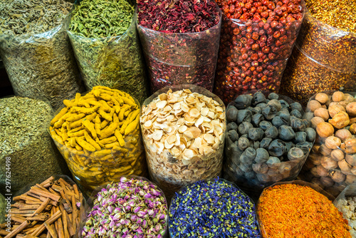 Bags of colorful spices at market in Dubai, United Arab Emirates photo