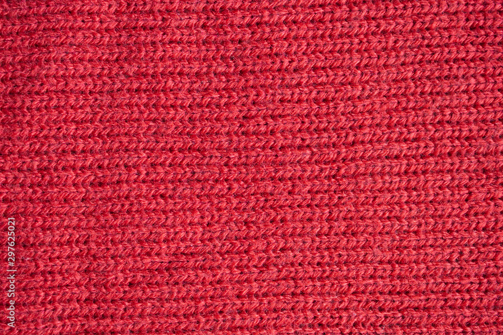 Red knitted wool fabric texture background Red knitted wool fabric texture background