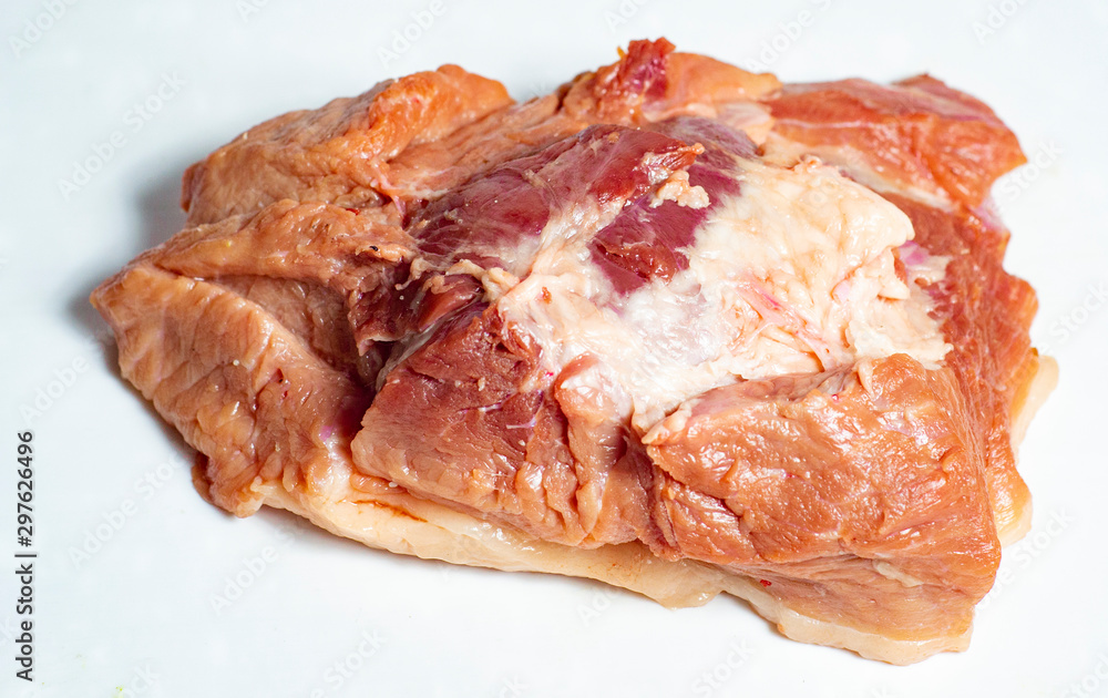 large piece of bacon isolated on white background large piece of bacon isolated on white background