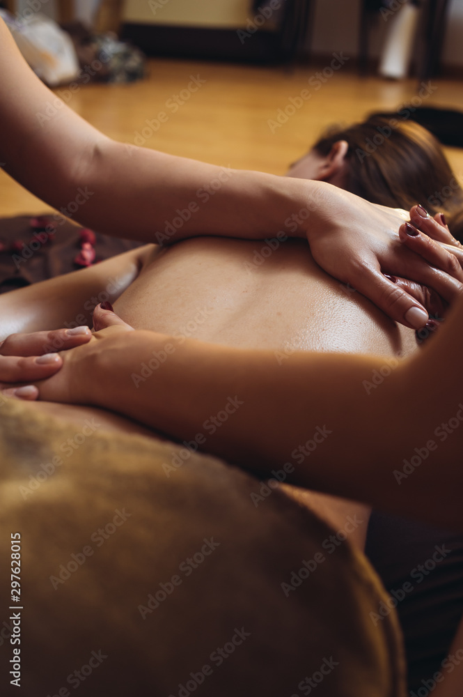 Fototapeta premium Relax massage in four hands for women