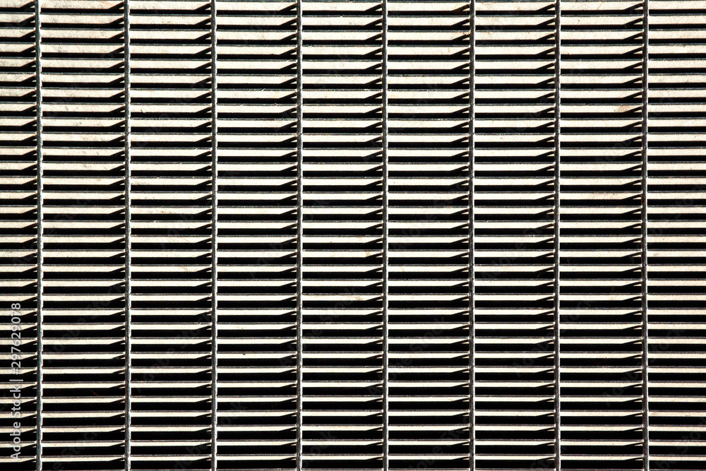 Detail of a metal grate for water runoff. Useful for textures and patterns. Detail of a metal grate for water runoff. Useful for textures and patterns.