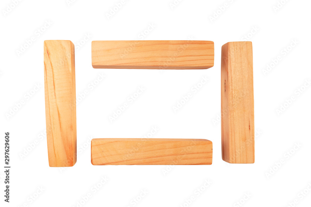 Wood bar pieces on isolated background. Vertical and horizontal wooden bars as concept of kids development toy, construction or decoration. Mockup frame section Wood bar pieces on isolated background. Vertical and horizontal wooden bars as concept of kids development toy, construction or decoration. Mockup frame section