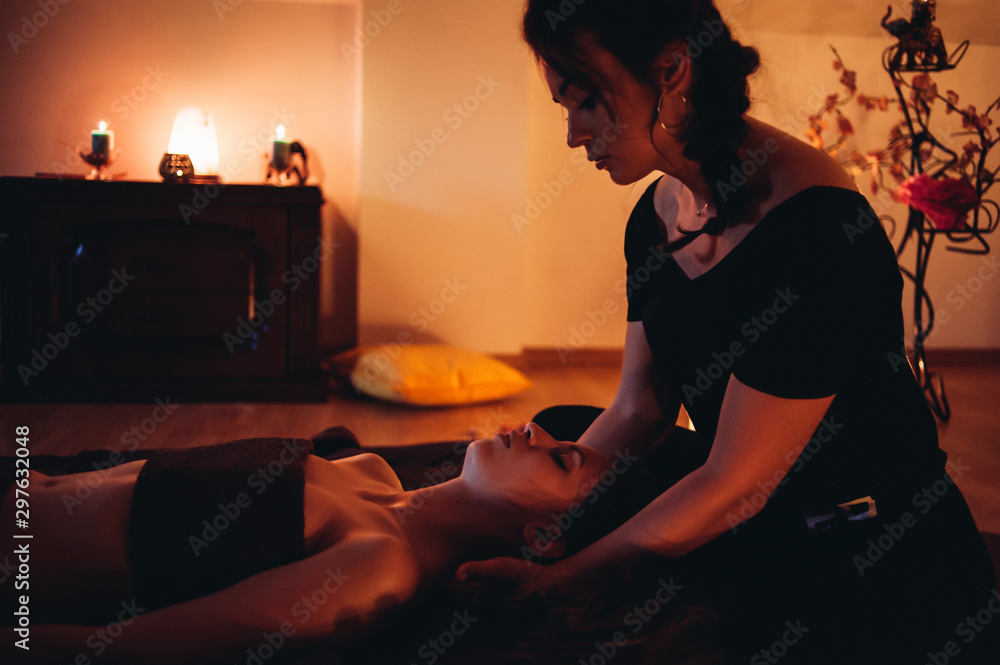 Sensual massage with oil in a massage salon Sensual massage with oil in a massage salon