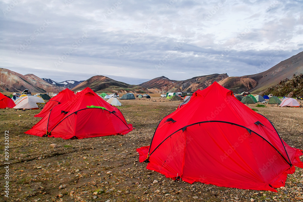 Camping tents in the mountains, tents and clothing line with volcanic mountain background, Landmannalaugar, Iceland