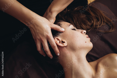 Sensual massage with oil in a massage salon