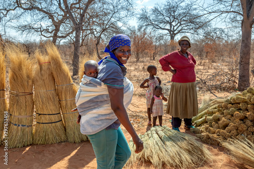 African woman carry child