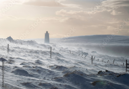 Lighthouse in Iceland in the middle of snow storm