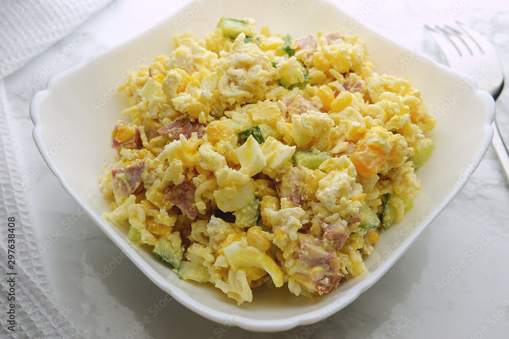 Salad of pasta, bacon, corn, eggs and cucumber Salad of pasta, bacon, corn, eggs and cucumber