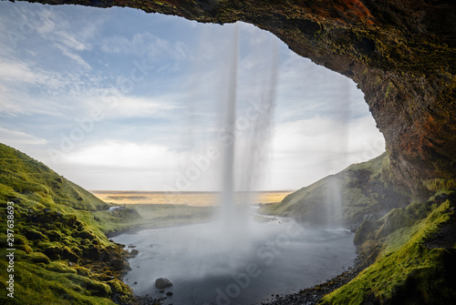  Seljalandsfoss Waterfall view from behind in Iceland