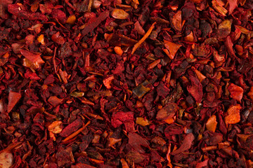 Crushed pepper, red background of spices. Copy space.