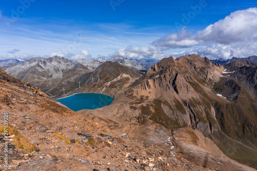 One of the many high altitude lakes in the Alps, on the border between Italy and Switzerland, near the town of Riale, Italy - October 2019.