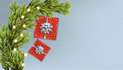 Merry christmas banner with golden ribbon gift box, fir tree leaves and warm ...