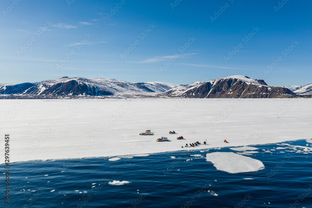 Tourists visit the floe edge near Sirmilik National Park in Nunavut, Canada