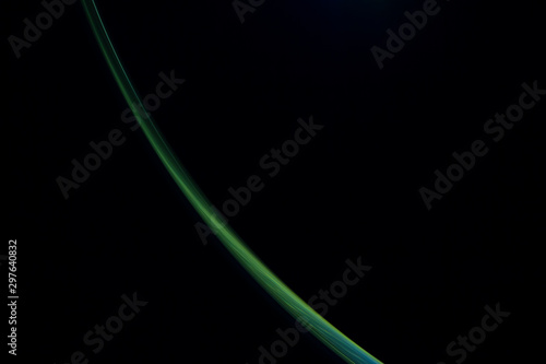 green  light lines on a black background