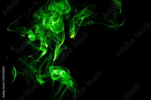 Green smoke on black background