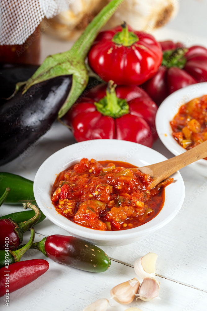 Chemen sauce in bowl with vegetables. Chemen sauce in bowl with vegetables.