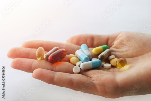 Medicine. Man, doctor with pill in hand. Medical drug for health, healthcare