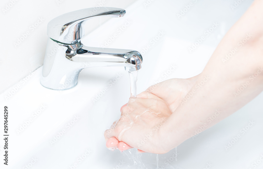 Washing hands with soap under running water. Concept healtcare and medical Washing hands with soap under running water. Concept healtcare and medical