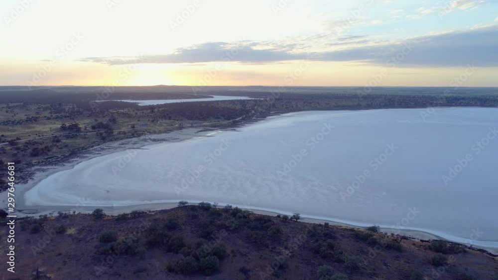 Aerial descend over desert and salt lake at sunrise in Australia Aerial descend over desert and salt lake at sunrise in Australia