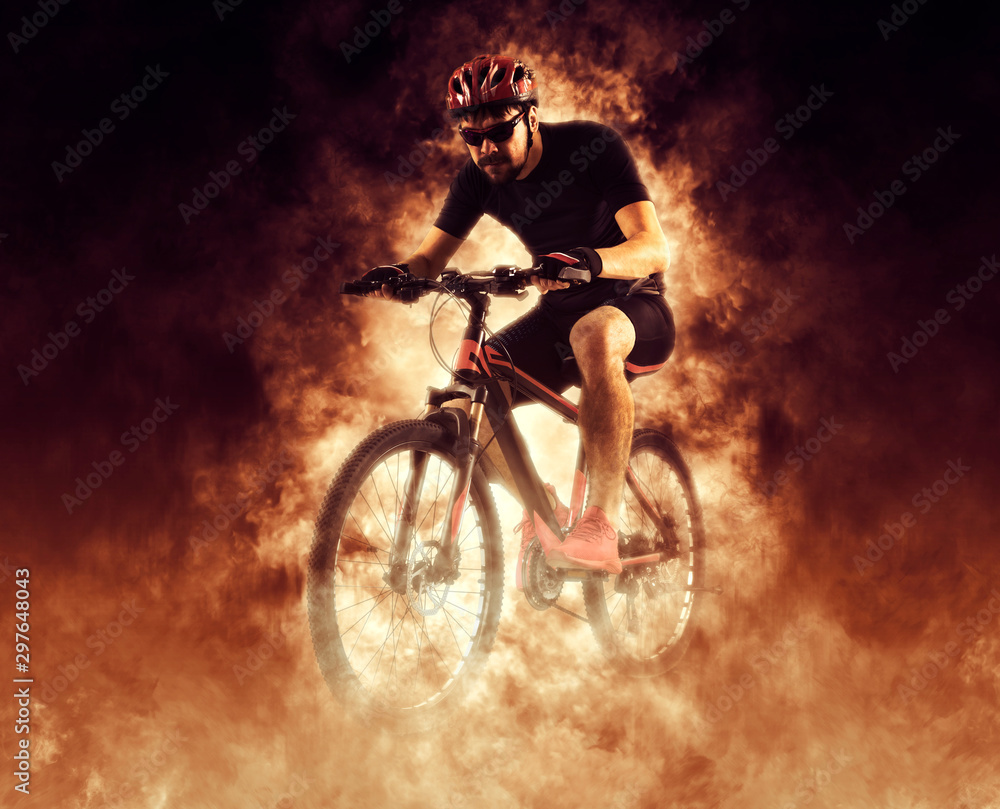 Obraz premium Man extreme biking in motion