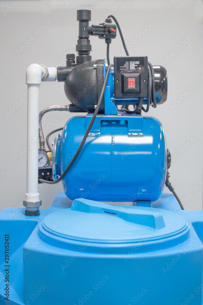 Blue water tank with household water pump station Blue water tank with household water pump station