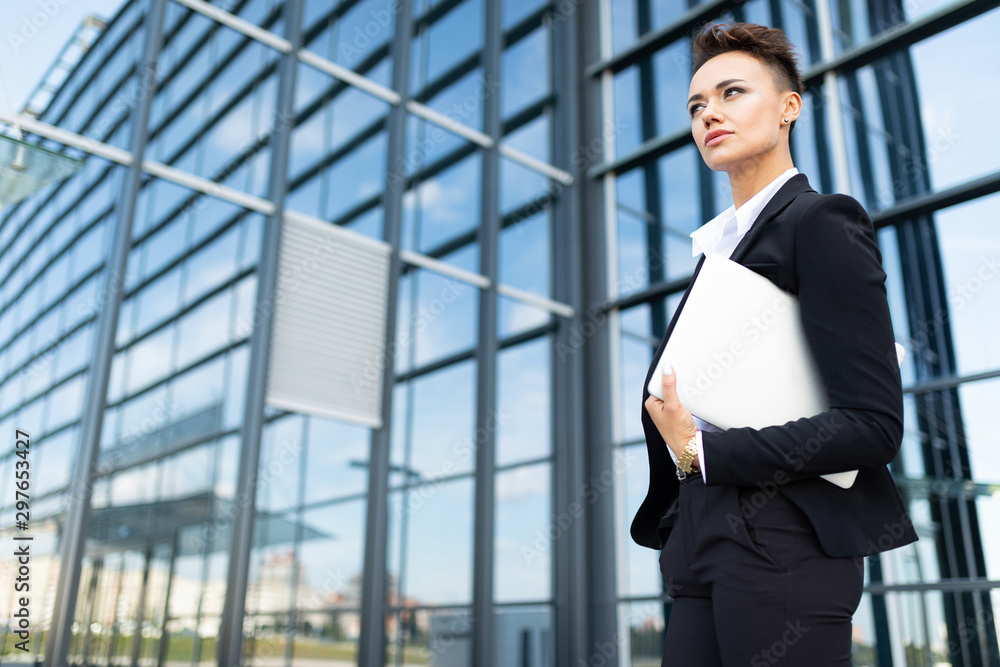 businesswoman working outdoors with laptop businesswoman working outdoors with laptop