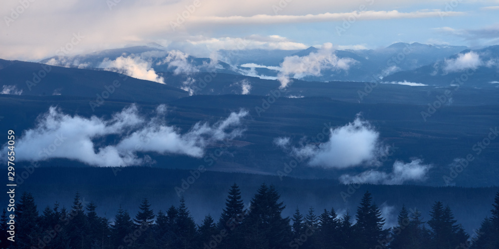 Panoramic view of the mountain covered by clouds in Oregon near Portland.