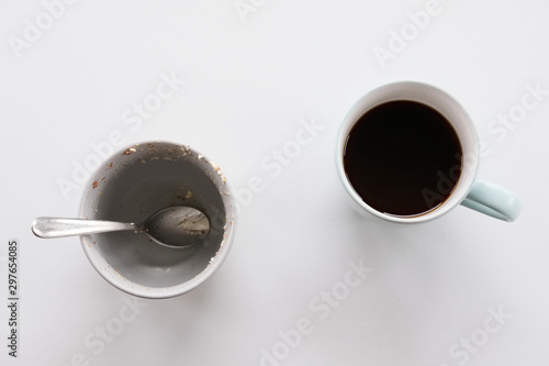 Porridge bowl and black coffee on breakfast table photo