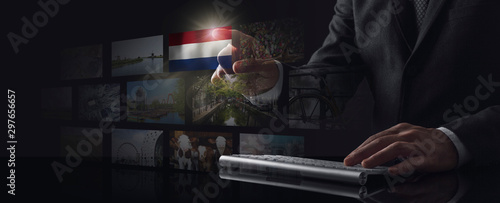 Businessman working on screen with Netherlands photo