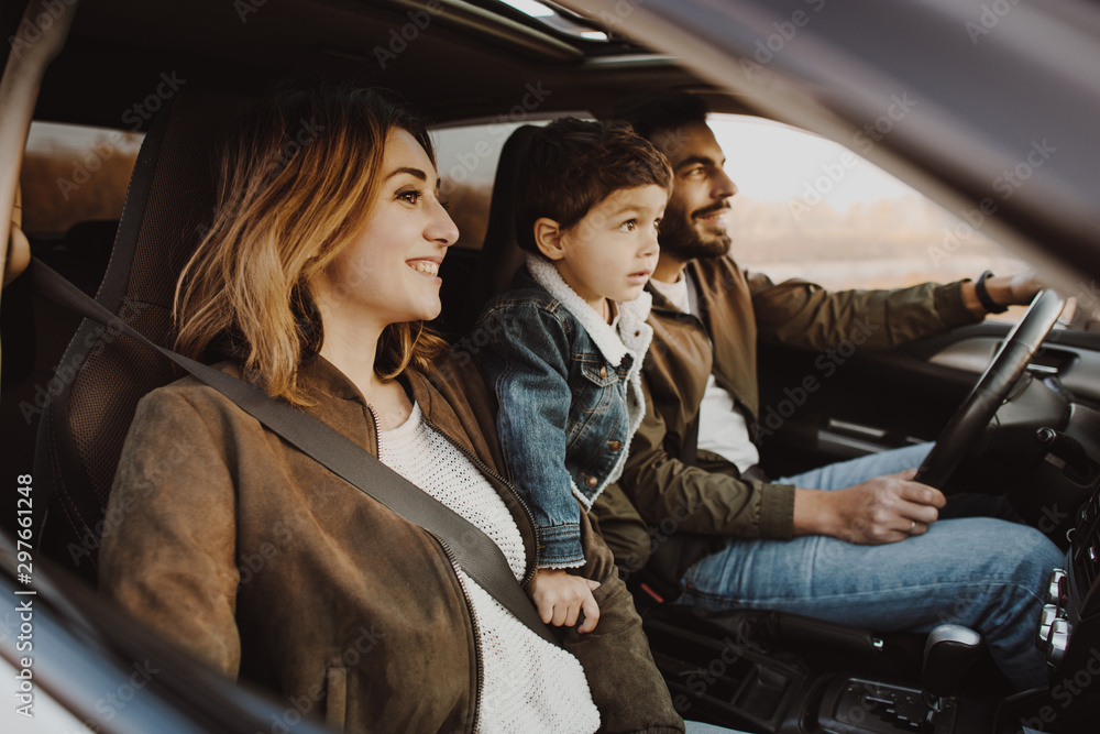 Happy family sitting in the car. Happy family sitting in the car.