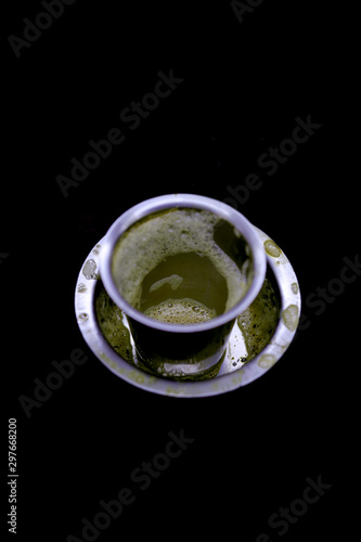 After drink filter coffee cup and empty space on black background photo
