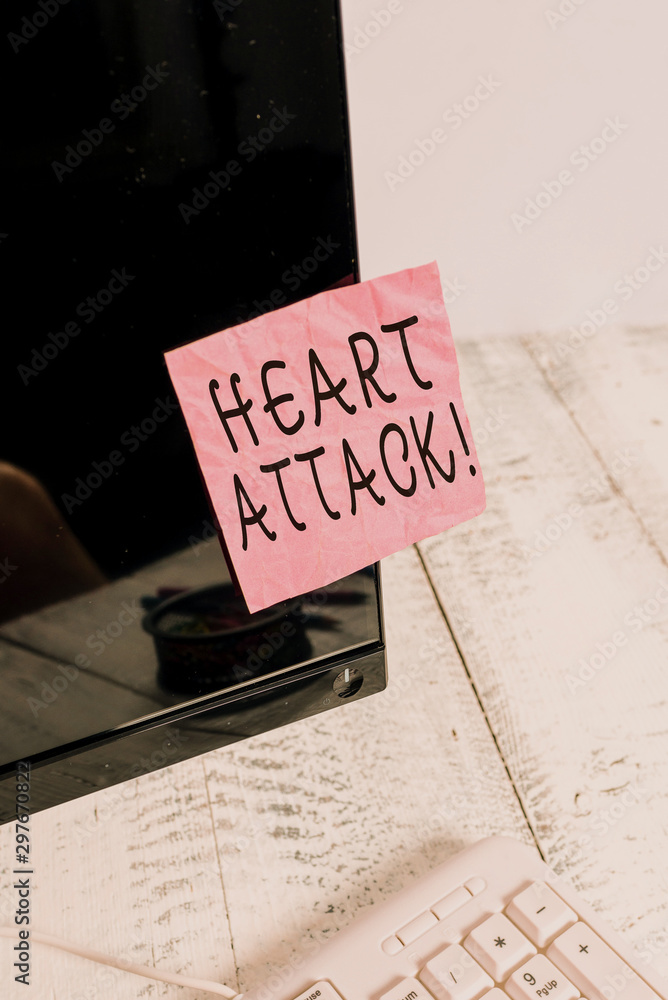 Conceptual hand writing showing Heart Attack. Concept meaning sudden occurrence of coronary thrombosis resulting in death Notation paper computer monitor screen near white keyboard Conceptual hand writing showing Heart Attack. Concept meaning sudden occurrence of coronary thrombosis resulting in death Notation paper computer monitor screen near white keyboard