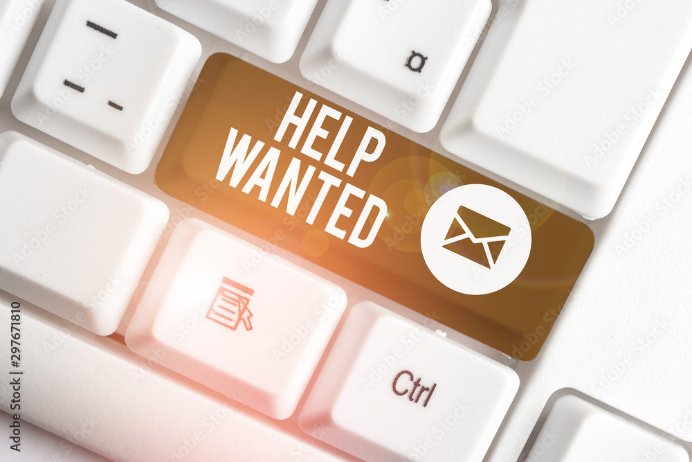 Word writing text Help Wanted. Business photo showcasing An ad in the paper an employer places to find a new employee White pc keyboard with empty note paper above white background key copy space Word writing text Help Wanted. Business photo showcasing An ad in the paper an employer places to find a new employee White pc keyboard with empty note paper above white background key copy space
